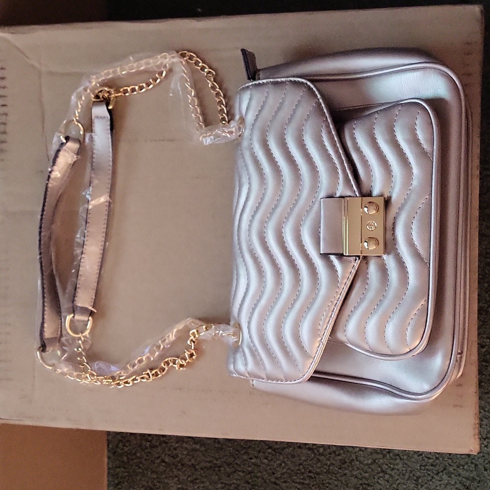 New silver quilted purse